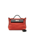 HERMES 24/24-29 BAG CLEMENCE/ SWIFT ROUGE PIVOINE/NOIR SHW