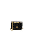 CHANEL MINI 2.55 REISSUE FLAP BAG AGED CALFSKIN BLACK BRUSHED GHW (MICROCHIP)