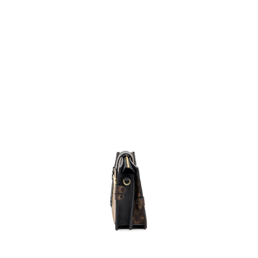 LOUIS VUITTON TRUNK CLUTCH MONOGRAM REVERSE CANVAS GHW