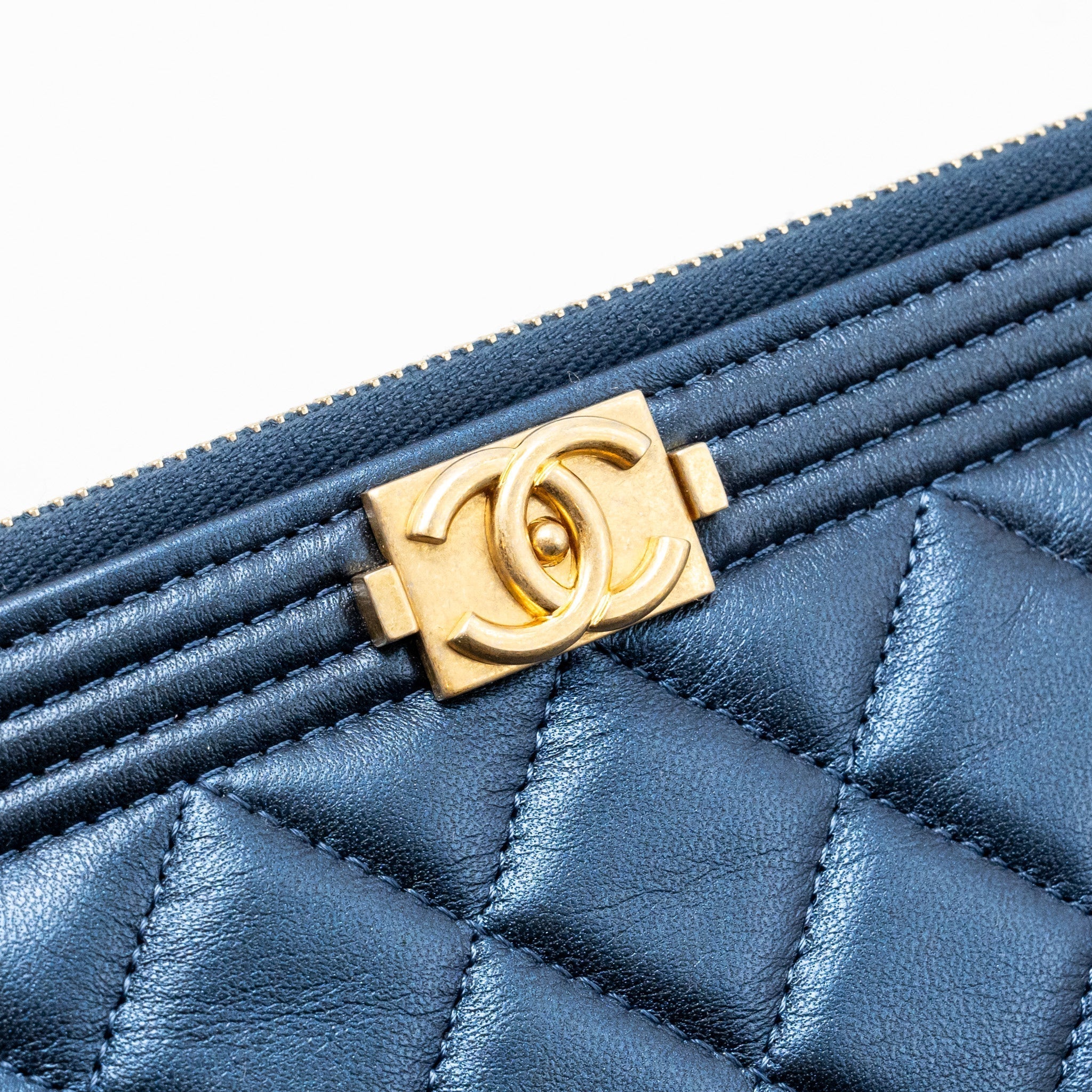 CHANEL BOY CLUTCH CALFSKIN PEARLY BLUE GHW