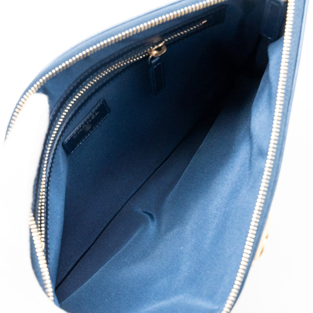 CHANEL BOY CLUTCH CALFSKIN PEARLY BLUE GHW