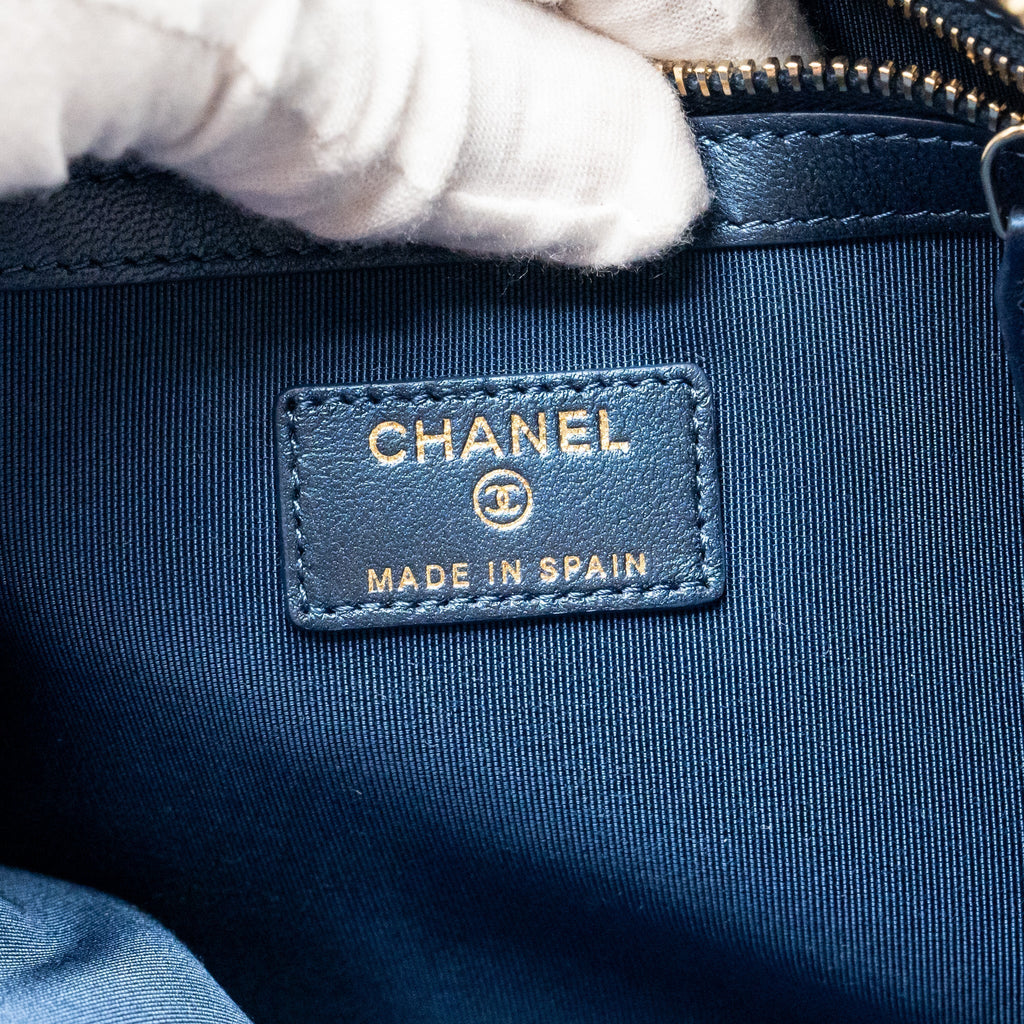 CHANEL BOY CLUTCH CALFSKIN PEARLY BLUE GHW