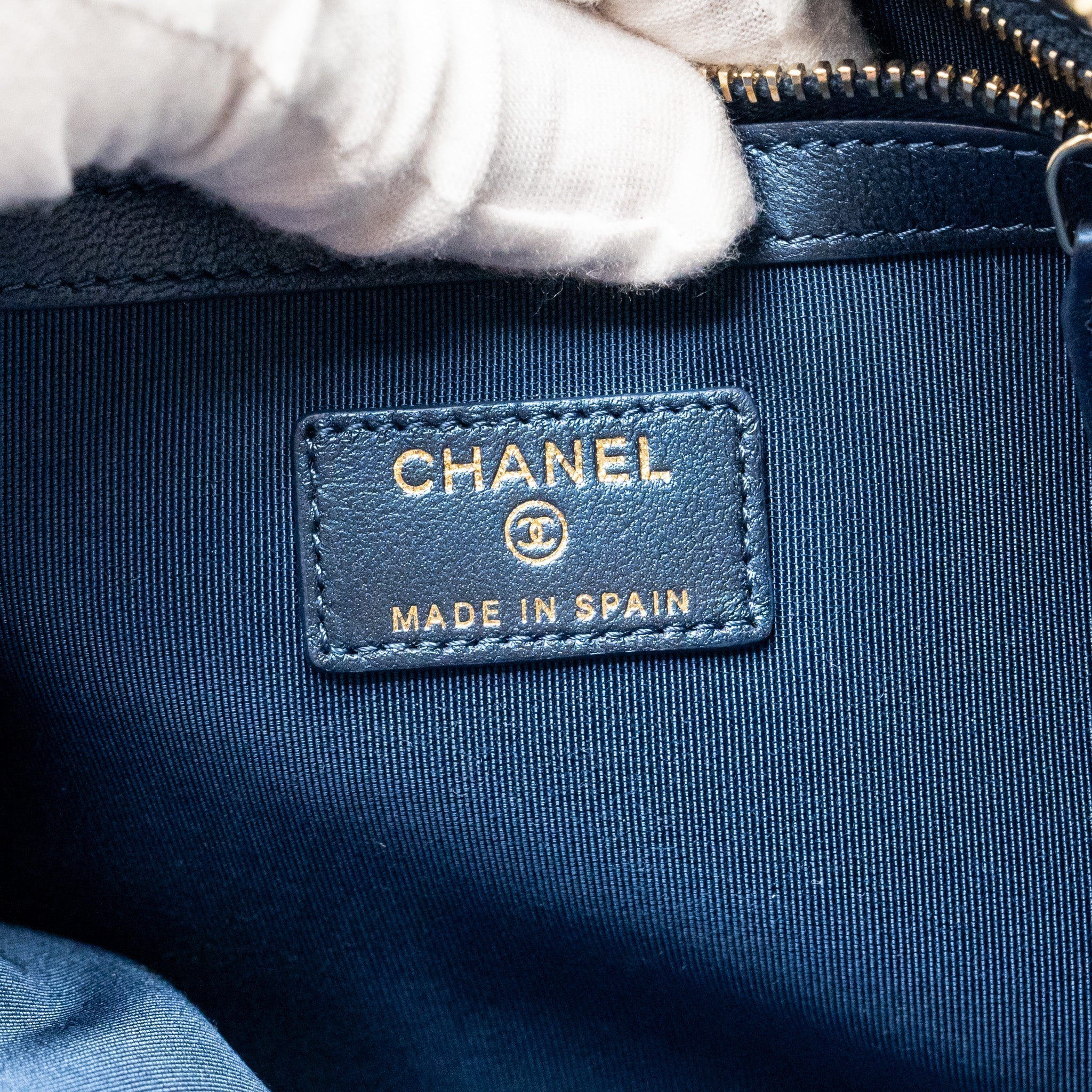 CHANEL BOY CLUTCH CALFSKIN PEARLY BLUE GHW