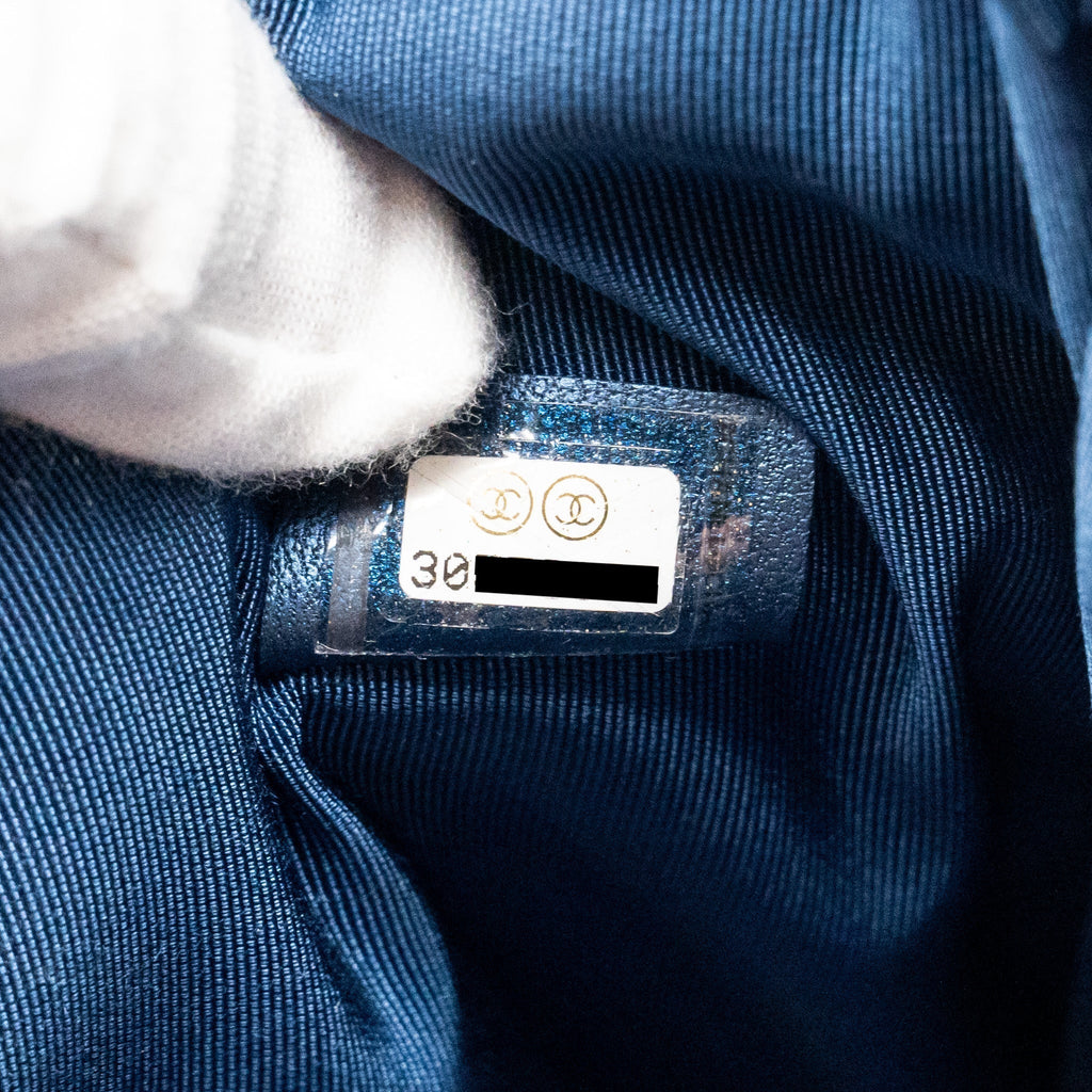 CHANEL BOY CLUTCH CALFSKIN PEARLY BLUE GHW