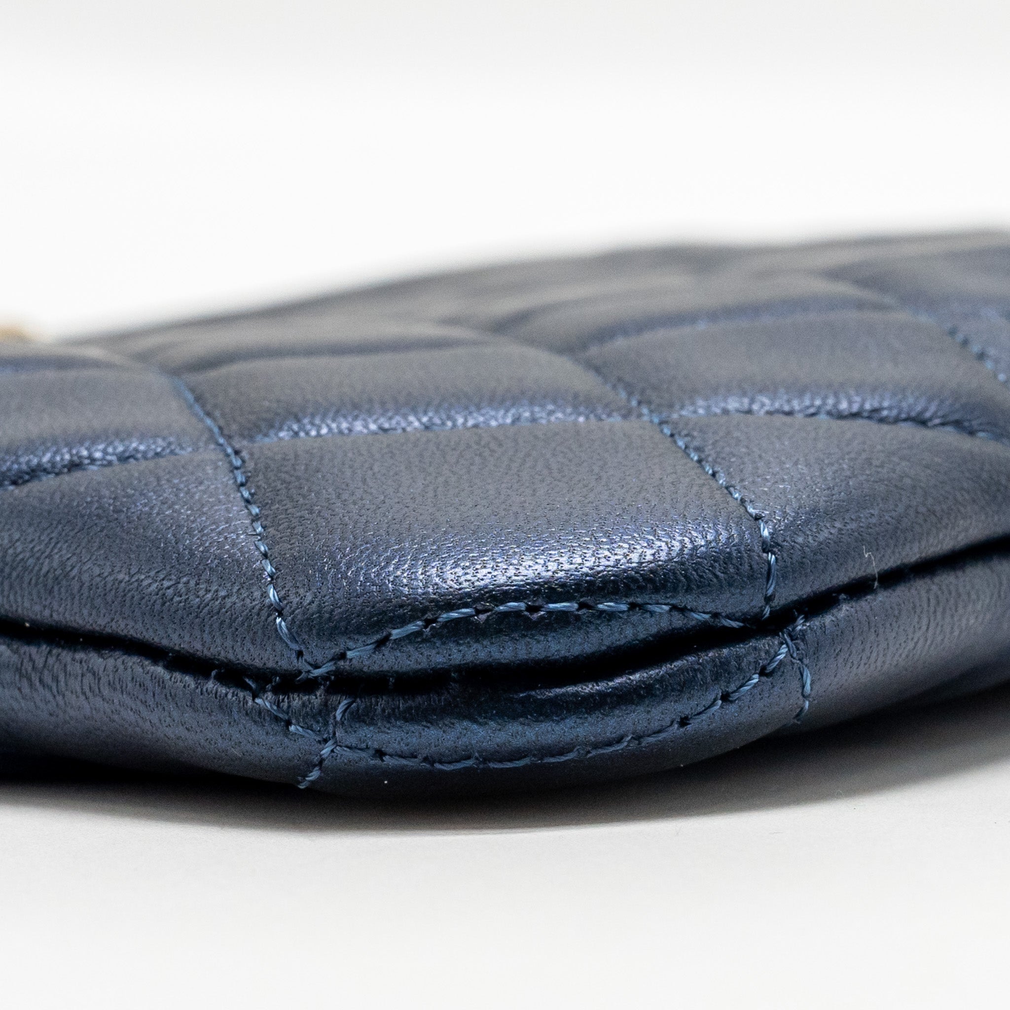 CHANEL BOY CLUTCH CALFSKIN PEARLY BLUE GHW