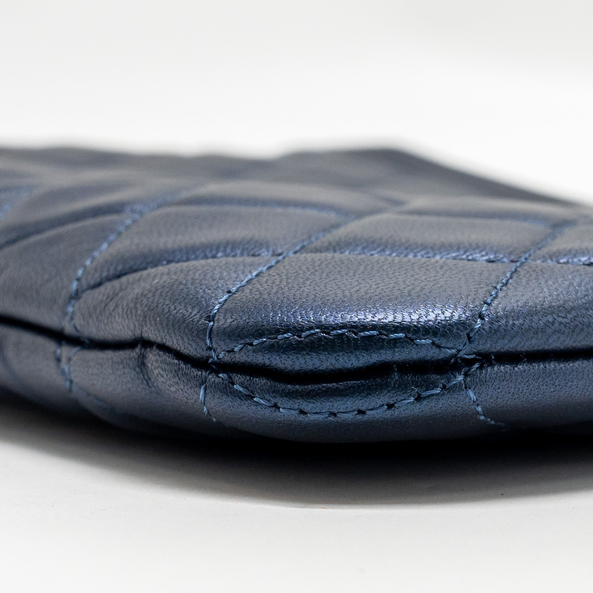 CHANEL BOY CLUTCH CALFSKIN PEARLY BLUE GHW