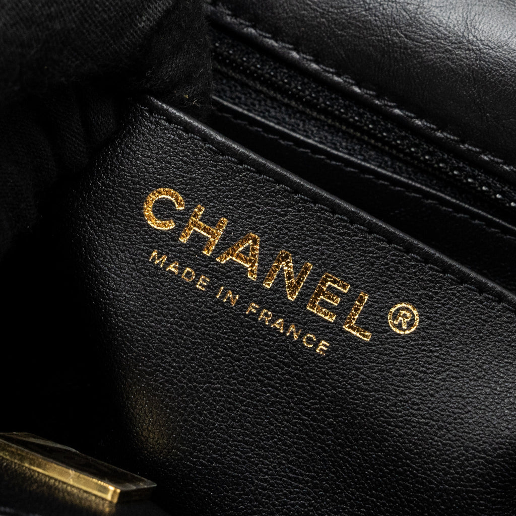 CHANEL MINI 2.55 REISSUE FLAP BAG AGED CALFSKIN BLACK GHW (MICROCHIP)
