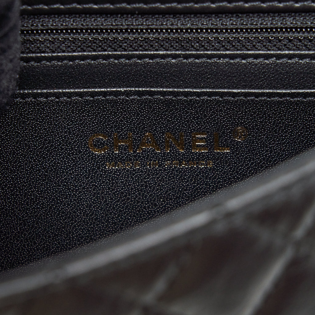 CHANEL MINI 2.55 REISSUE FLAP BAG AGED CALFSKIN BLACK BRUSHED GHW (MICROCHIP)