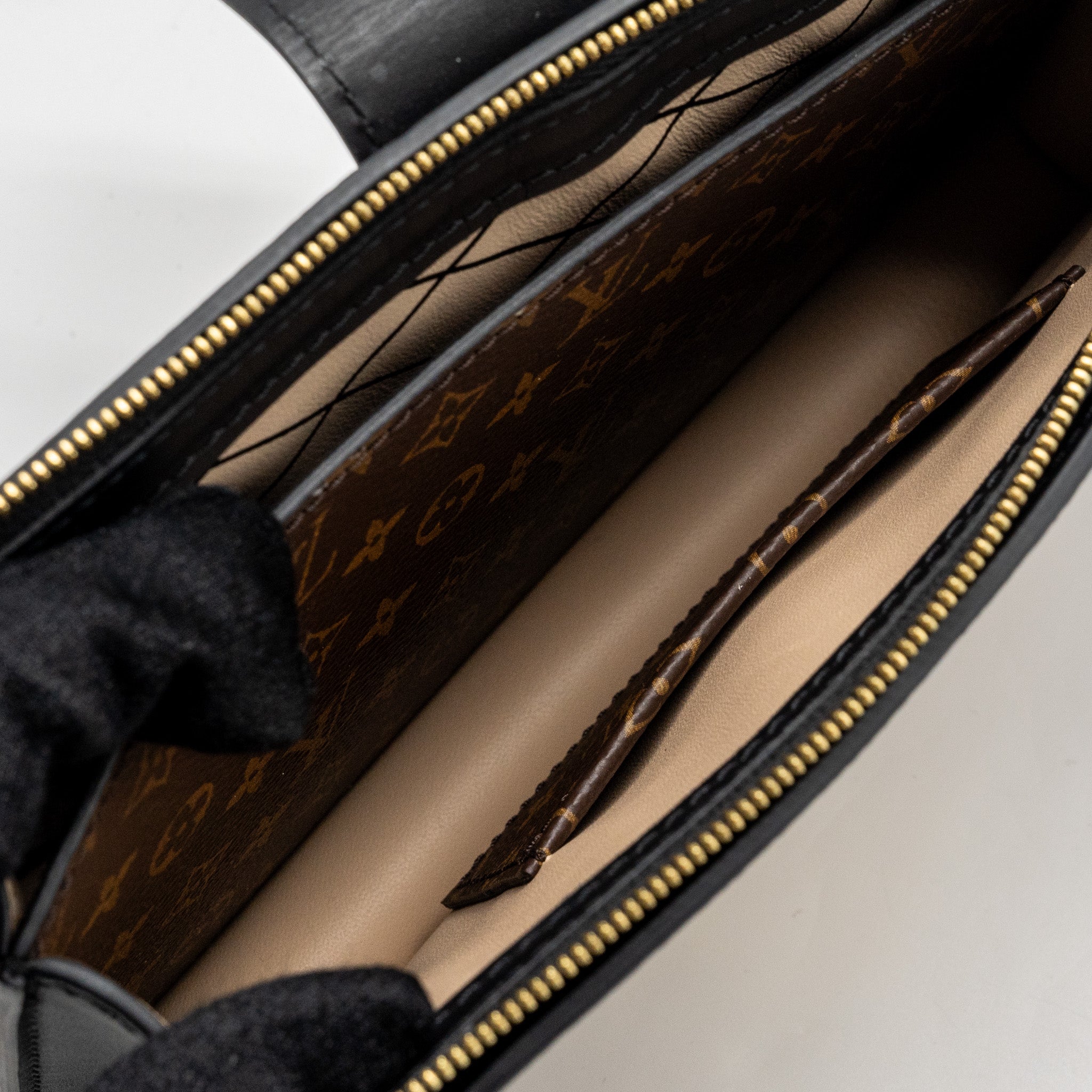 LOUIS VUITTON TRUNK CLUTCH MONOGRAM REVERSE CANVAS GHW