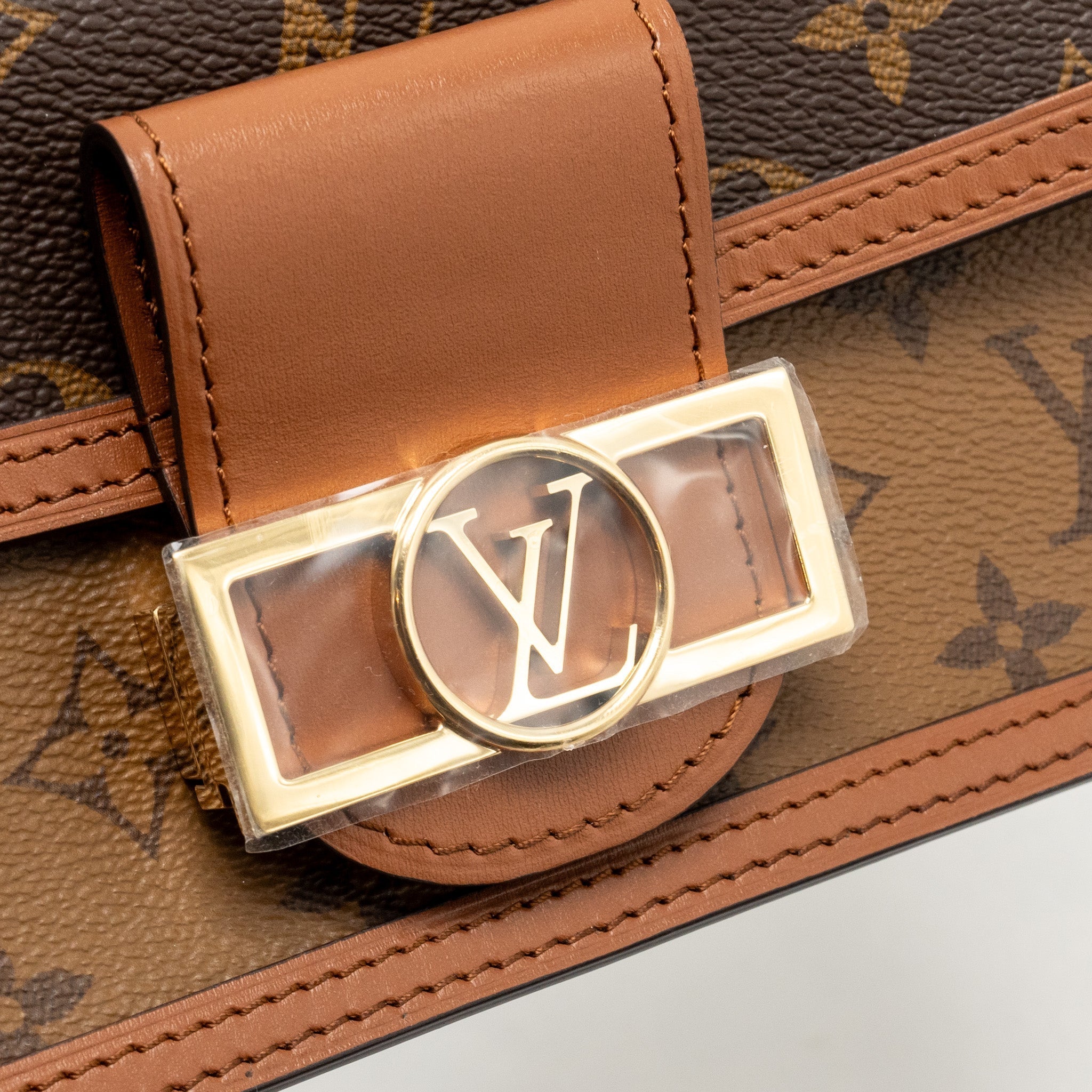 LOUIS VUITTON DAUPHINE EAST-WEST CHAIN SHOULDER BAG MONOGRAM REVERSE CANVAS GHW