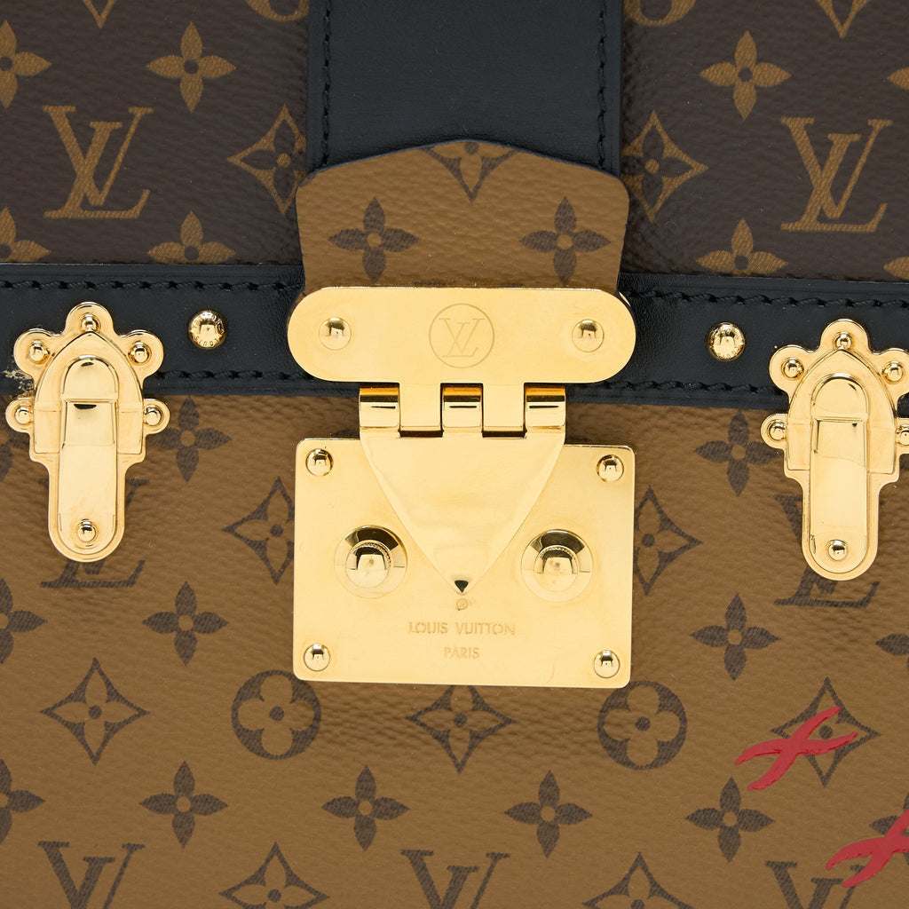 LOUIS VUITTON TRUNK CLUTCH MONOGRAM REVERSE CANVAS GHW