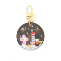 LOUIS VUITTON ILLUSTRE LONDON XMAS BAG CHARM AND KEY HOLDER
