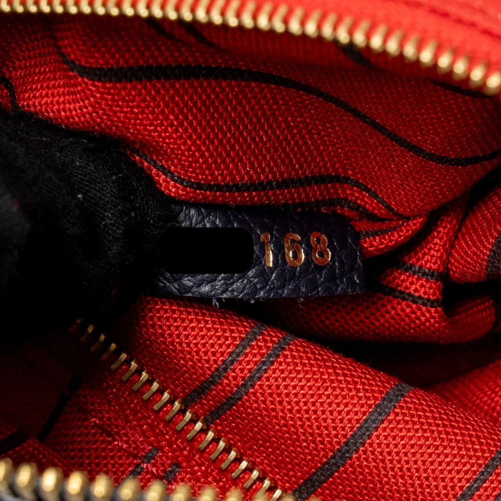 LOUIS VUITTON SPEEDY 25 BANDOULIERE MONOGRAM EMPREINTE NAVY / RED GHW