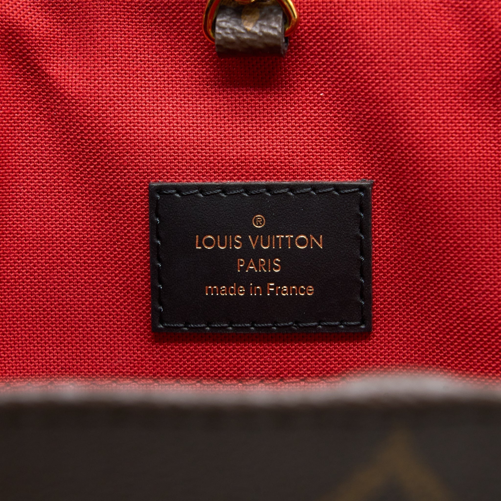 LOUIS VUITTON ON THE GO GM MONOGRAM REVERSE CANVAS GHW