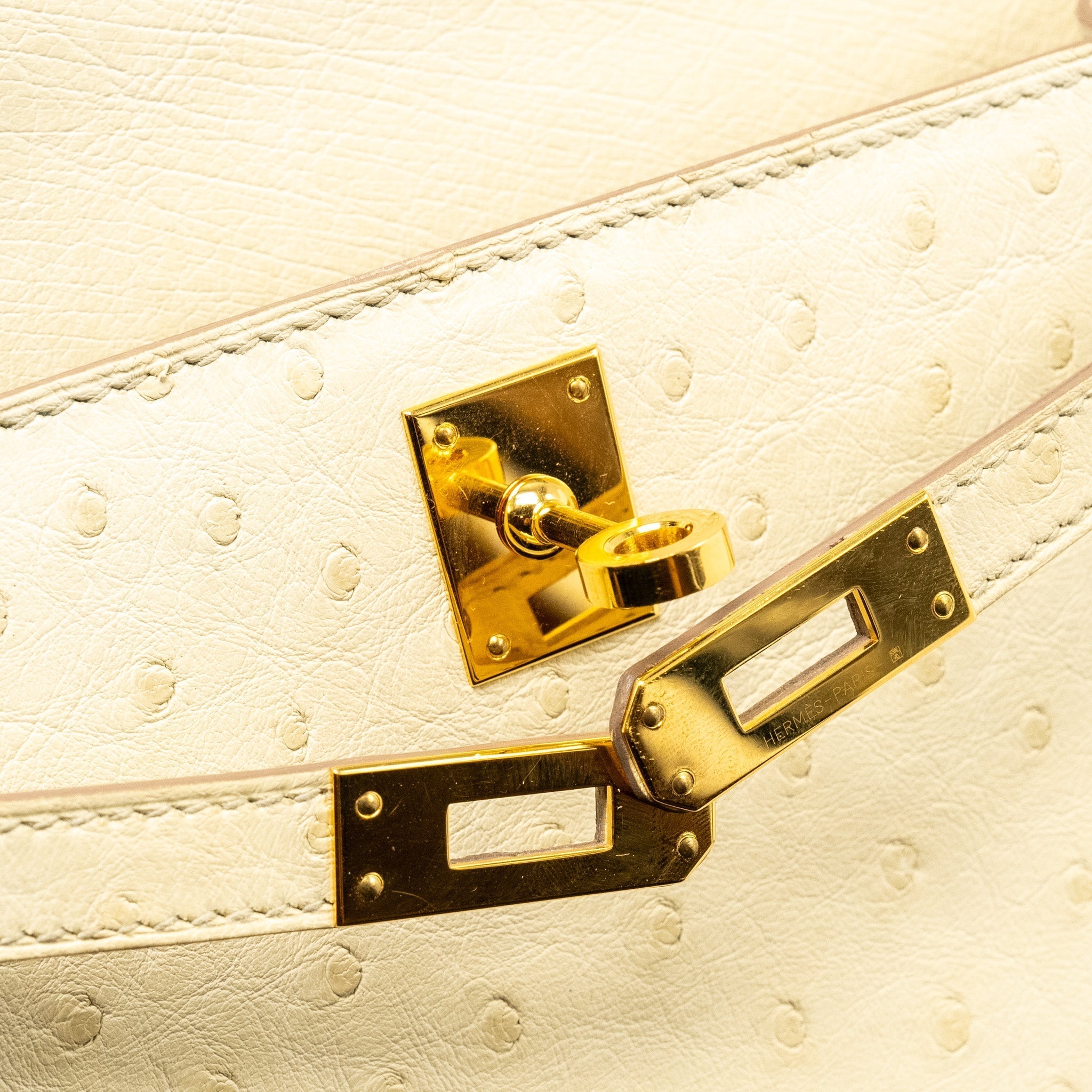 HERMES KELLY POCHETTE OSTRICH BETON GHW