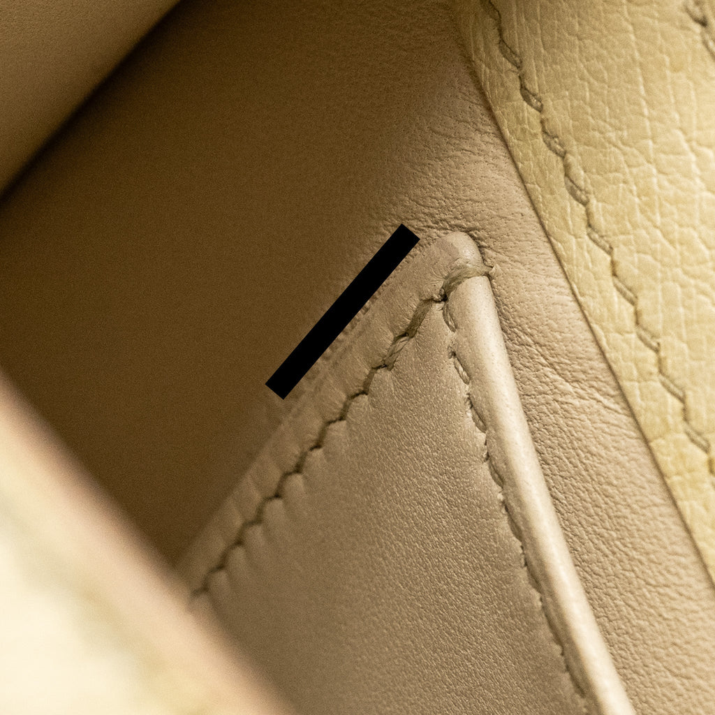 HERMES KELLY POCHETTE OSTRICH BETON GHW